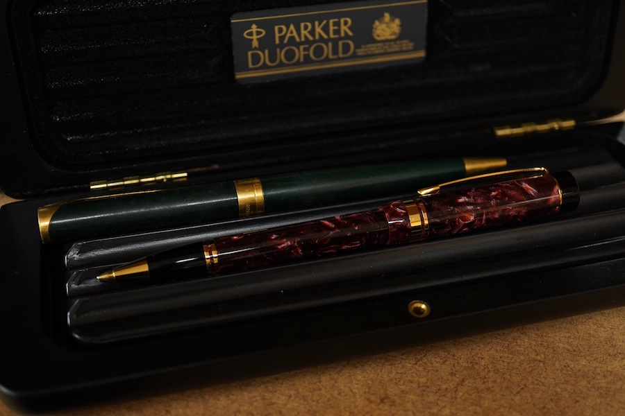 A quantity of various pens to include Parker Duofold and two Parker pen cases. Condition - varies